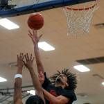 ECCs Leon Sayers (0) shoots the ball during a mens game between the Everett Community College Trojans and Edmonds College Tritons at Seaview Gymnasium at Edmonds College in Lynnwood, Washington on Wednesday Jan. 25, 2023. The Tritons won, 91-84. (Annie Barker / The Herald)