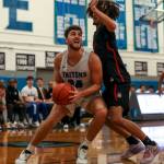 ECCs Elyon Zevenbergen (34) shoots the ball during a mens game between the Everett Community College Trojans and Edmonds College Tritons at Seaview Gymnasium at Edmonds College in Lynnwood, Washington on Wednesday Jan. 25, 2023. The Tritons won, 91-84. (Annie Barker / The Herald)