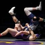Lake Stevens Esteban Sedano Jr. and Glacier Peaks John Allison wrestle at Lake Stevens High School on Thursday Jan. 26, 2023. (Annie Barker / The Herald)
