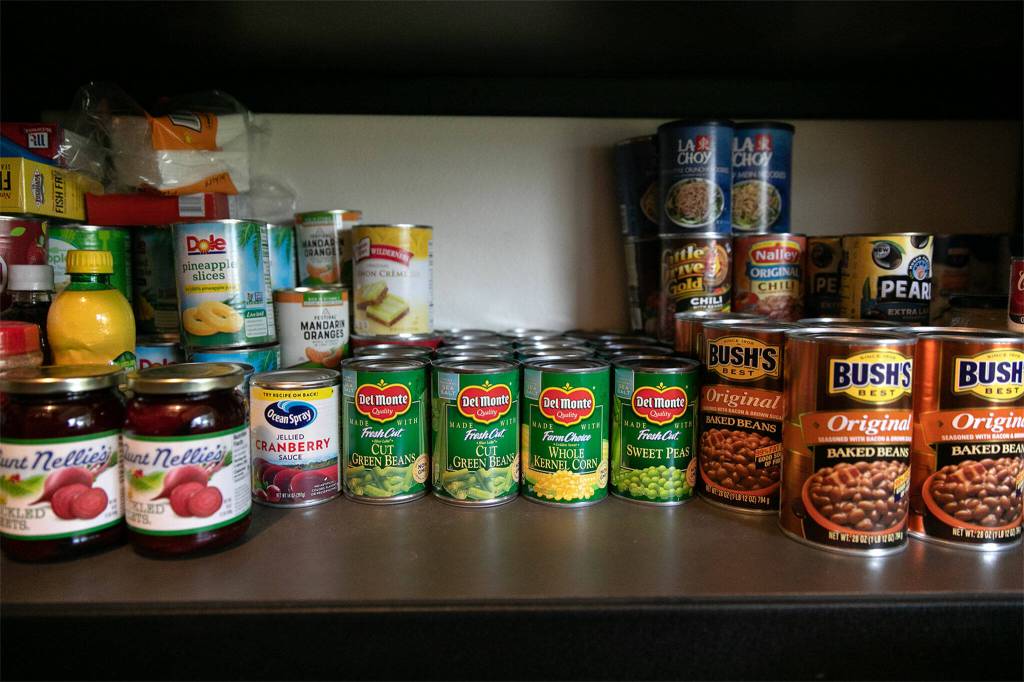 Gail and Ron Thompson keep enough shelf-stable food to feed dozens at their home in Oso. (Ryan Berry / The Herald)