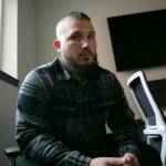 Nathanael Engen, founder of Black Forest Mushrooms, sits in a conference room at Think Tank Cowork on Jan. 27, in downtown Everett. (Ryan Berry / The Herald)