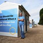 CEO Amy King standing outside of a Pallet shelter. (Courtesy of Pallet)