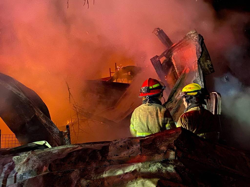 Firefighters battled an early morning blaze on Dec. 2, 2022 at the Glendale Road property in Clinton. (South Whidbey Fire)