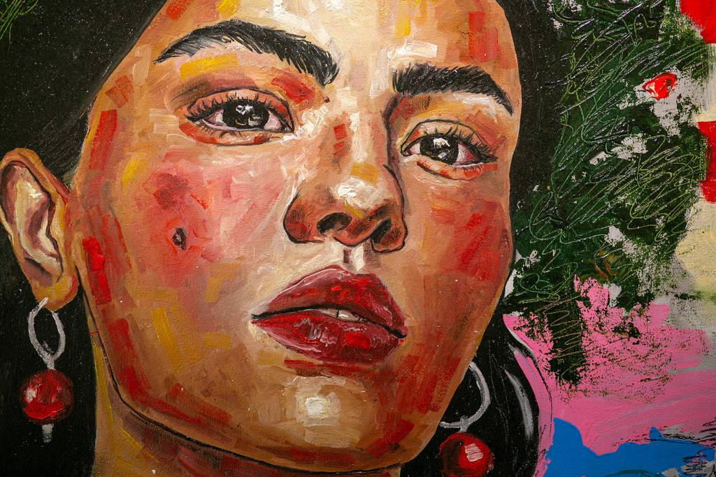 Brush strokes are visible on a large acrylic painting by Mariia Yarchak during a public event highlighting the For Ukraine: Art of Freedom exhibit at the Schack Art Center on Saturday, in downtown Everett. (Ryan Berry / The Herald)