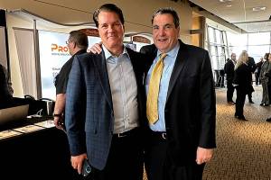 Kevin Michaels (left) and Richard Aboulafia, managing directors at AeroDynamic Advisory, an aerospace consulting firm attend the Pacific Northwest Aerospace Alliance conference Wednesday at the Lynnwood Convention Center. (Janice Podsada / The Herald)