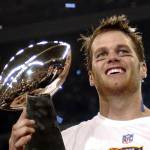 New England quarterback Tom Brady holds the Vince Lombardi Trophy after the Patriots beat the Carolina Panthers 32-29 in Super Bowl 38 on Feb. 1, 2004, in Houston. (AP Photo/Dave Martin)