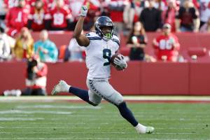 Seattle Seahawks running back Kenneth Walker III (9) against the San Francisco 49ers during an NFL wild card playoff football game in Santa Clara, Calif., Saturday, Jan. 14, 2023. (AP Photo/Josie Lepe)