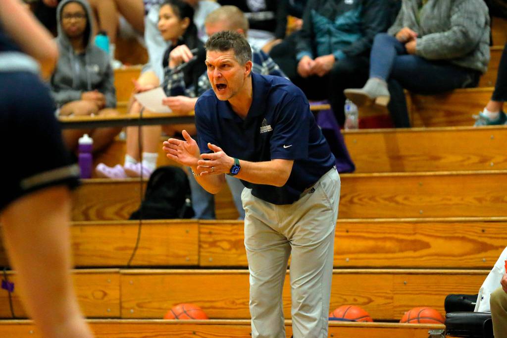 Glacier Peak head coach Brian Hill calls out to his team during play against Kamiak on Wednesday, Feb 1, 2023, at Kamiak High School in Mukilteo, Washington. (Ryan Berry / The Herald)
