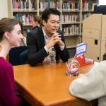 Switzerland delegate Markus Herrmann listens while 12th grade students speak with him during a special event set up for their AP Comparative Government class at Glacier Peak High School on Thursday, Feb. 2, 2023 in Snohomish, Washington. (Olivia Vanni / The Herald)