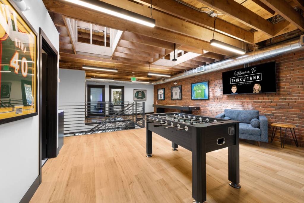 Coworking spaces like Think Tank Cowork incorporate common areas for members to enjoy and unwind.