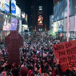 Demonstrators gather during a protest in New York Times Square on Jan. 28 in response to the death of Tyre Nichols, who died after being beaten by Memphis police during a traffic stop. (Yuki Iwamura / Associated Press)