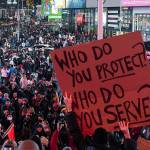 Demonstrators gather during a protest in Times Square on Saturday, Jan. 28, 2023, in New York, in response to the death of Tyre Nichols, who died after being beaten by Memphis police during a traffic stop. (AP Photo/Yuki Iwamura)