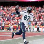 Seahawks tight end Noah Fant celebrates after catching a touchdown pass during the second half of a game against the Kansas City Chiefs on Dec. 24, 2022, in Kansas City, Mo. (AP Photo/Ed Zurga)