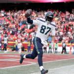 Seattle Seahawks tight end Noah Fant celebrates after catching a touchdown pass during the second half of an NFL football game against the Kansas City Chiefs Saturday, Dec. 24, 2022, in Kansas City, Mo. The Chiefs won 24-10. (AP Photo/Ed Zurga)