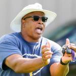Mark Stewart, while head coach at Mariner, demonstrates proper technique during practice in 2019 at Mariner High School in Everett. (Kevin Clark / The Herald)