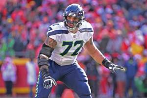 Seattle Seahawks offensive tackle Abraham Lucas (72) gets set during a play in an NFL football game against the Kansas City Chiefs Saturday, Dec. 24, 2022, in Kansas City, Mo. (AP Photo/Peter Aiken)