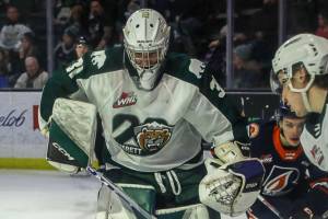 Silvertips’ Tyler Palmer (31) and Ty Gibson (6) defend the goal during a game between the Silvertips and Kamloops Blazers at the Angel of the Winds Arena on Friday, Jan. 13, 2023. The Silvertips fell to the Kamloops, 3-6. (Annie Barker / The Herald)
