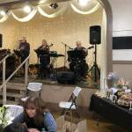 Tom and Jill Hudon, and John Salyer perform for the crowd at the Granite Falls Food Banks Empty Bowl fundraiser Saturday, Feb. 11, in Granite Falls. (Joy Borkholder / The Herald)