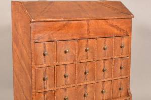 This seed chest was made about 1870 out of inexpensive wood for a practical purpose. Now it can command a higher price than some designer pieces.