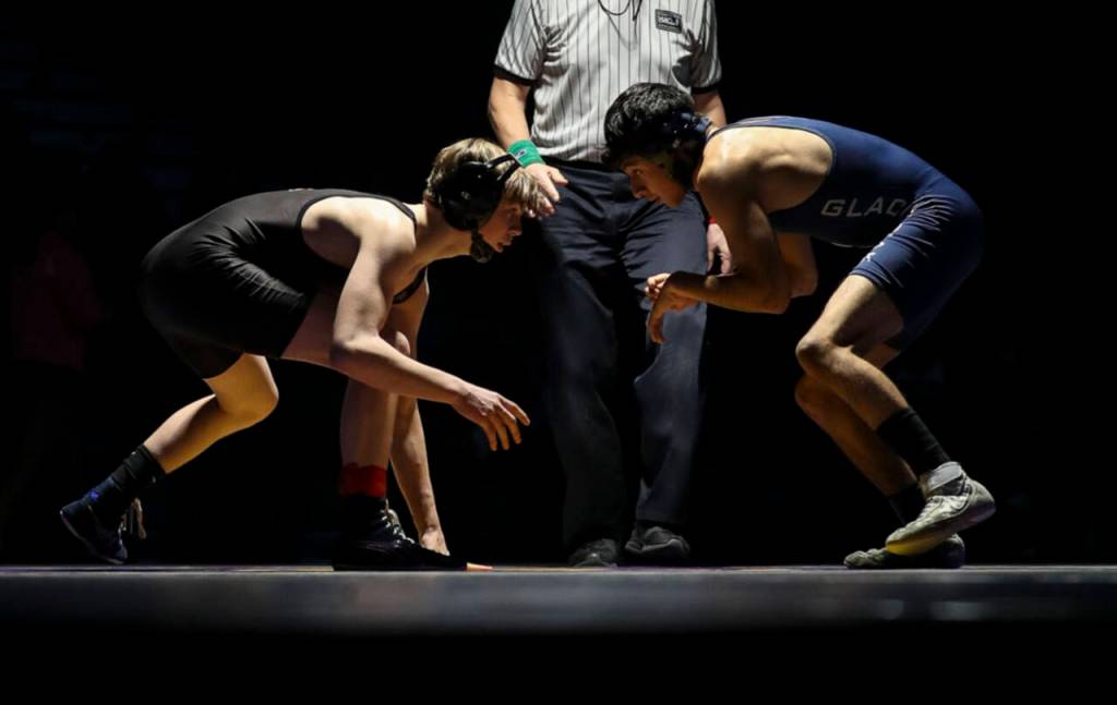 Lake Stevens Jacob Christianson (left) is the second-ranked wrestler in Class 4A at 113 pounds. (Annie Barker / The Herald)
