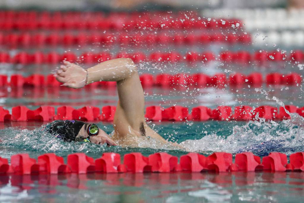 Kamiaks Bryan Zi Wong wins Heat 2 of the 500 Yard Freestyle during the 4A District 1 swim and dive championships at Snohomish Aquatic Center, in Snohomish, Washington on Saturday, Feb. 11, 2023. (Annie Barker / The Herald)