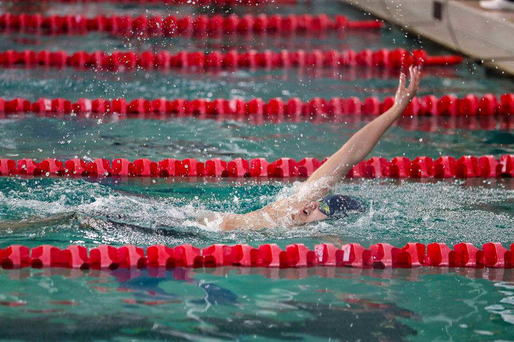 Mariners Vyron Domingo wins Heat 2 of the 200 Yard IM during the 4A District 1 swim and dive championships at Snohomish Aquatic Center, in Snohomish, Washington on Saturday, Feb. 11, 2023. (Annie Barker / The Herald)