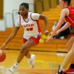 Stanwoods Chloe Santeford blows past a defender on her way to the basket in a win over Snohomish on Tuesday, Feb. 14, 2023, at Marysville Pilchuck High School in Marysville, Washington. (Ryan Berry / The Herald)