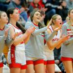 Stanwoods bench cheers on their team in a win over Snohomish on Tuesday, Feb. 14, 2023, at Marysville Pilchuck High School in Marysville, Washington. (Ryan Berry / The Herald)