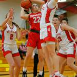 Snohomishs Jada Andresen tries to get off a shot in a crowd of defenders against Stanwood on Tuesday, Feb. 14, 2023, at Marysville Pilchuck High School in Marysville, Washington. (Ryan Berry / The Herald)