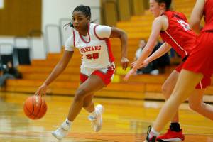 Stanwood’s Chloe Santeford blows past a defender on her way to the basket in a win over Snohomish on Tuesday, Feb. 14, 2023, at Marysville Pilchuck High School in Marysville, Washington. (Ryan Berry / The Herald)