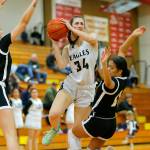Arlingtons Jenna Villa draws a foul on the shot against Lynnwood on Tuesday, Feb. 14, 2023, at Marysville Pilchuck High School in Marysville, Washington. (Ryan Berry / The Herald)