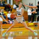 Arlingtons Jenna Villa steps away from a defender while looking to pass the ball against Lynnwood on Tuesday, Feb. 14, 2023, at Marysville Pilchuck High School in Marysville, Washington. (Ryan Berry / The Herald)