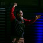 Stanwood head coach Ray Mather yells out instructions during a match against Arlington on Jan. 24 in Arlington. (Olivia Vanni / The Herald)