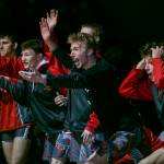 Stanwood wrestlers react to a pin during the match against Arlington on Tuesday, Jan. 24, 2023 in Arlington, Washington. (Olivia Vanni / The Herald)