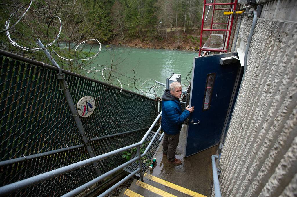 PUD generation engineering manager Scott Spahr enters the Henry M. Jackson Powerhouse on Friday near Sultan. (Ryan Berry / The Herald)