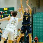 Shorecrests Brayden Fischer puts up a three against Arlington on Wednesday, Feb. 15, 2023, at Jackson High School in Mill Creek, Washington. (Ryan Berry / The Herald)