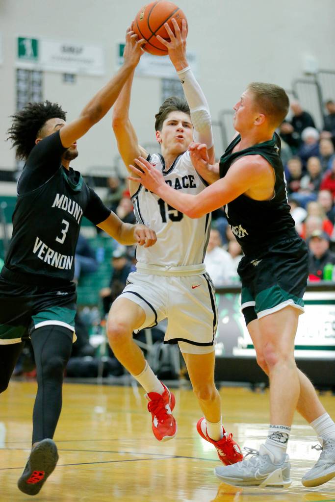 Mountlake Terraces Jaxon Dubiel tries to split the defense against Mount Vernon on Wednesday, Feb. 15, 2023, at Jackson High School in Mill Creek, Washington. (Ryan Berry / The Herald)