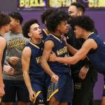 Mariner players react after winning a game between Jackson and Mariner at Lake Washington High School in Kirkland, Washington on Thursday, Feb. 16, 2023. After an intense back-and-forth in the final period Mariner defeated Jackson, 77-76. (Annie Barker / The Herald)