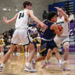 Mariners Macky James (3) moves with the ball during a game between Jackson and Mariner at Lake Washington High School in Kirkland, Washington on Thursday, Feb. 16, 2023. After an intense back-and-forth in the final period Mariner defeated Jackson, 77-76. (Annie Barker / The Herald)