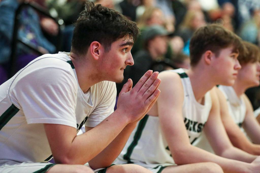 Jackson players watch during a game between Jackson and Mariner at Lake Washington High School in Kirkland, Washington on Thursday, Feb. 16, 2023. After an intense back-and-forth in the final period Mariner defeated Jackson, 77-76. (Annie Barker / The Herald)