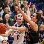 Lake Stevens Ella Edens (0) moves with the ball during a game between Lake Stevens and Mount Si at Lake Washington High School in Kirkland, Washington on Thursday, Feb. 16, 2023. Mount Si moves on in the bracket. (Annie Barker / The Herald)