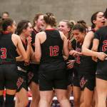 Mount Si players celebrate during a game between Lake Stevens and Mount Si at Lake Washington High School in Kirkland, Washington on Thursday, Feb. 16, 2023. Mount Si moves on in the bracket. (Annie Barker / The Herald)