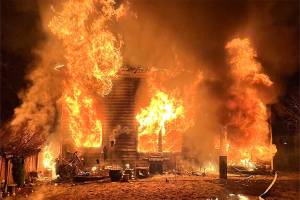 A house fire broke out early Friday morning in Mill Creek. Officials are still investigating the cause, but interior damage has delayed the efforts. (South County Fire)