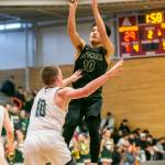 Marysville-Getchells Arion Palacol makes a jump shot during the game against Mount Vernon on Friday, Feb. 17, 2023 in Everett, Washington. (Olivia Vanni / The Herald)