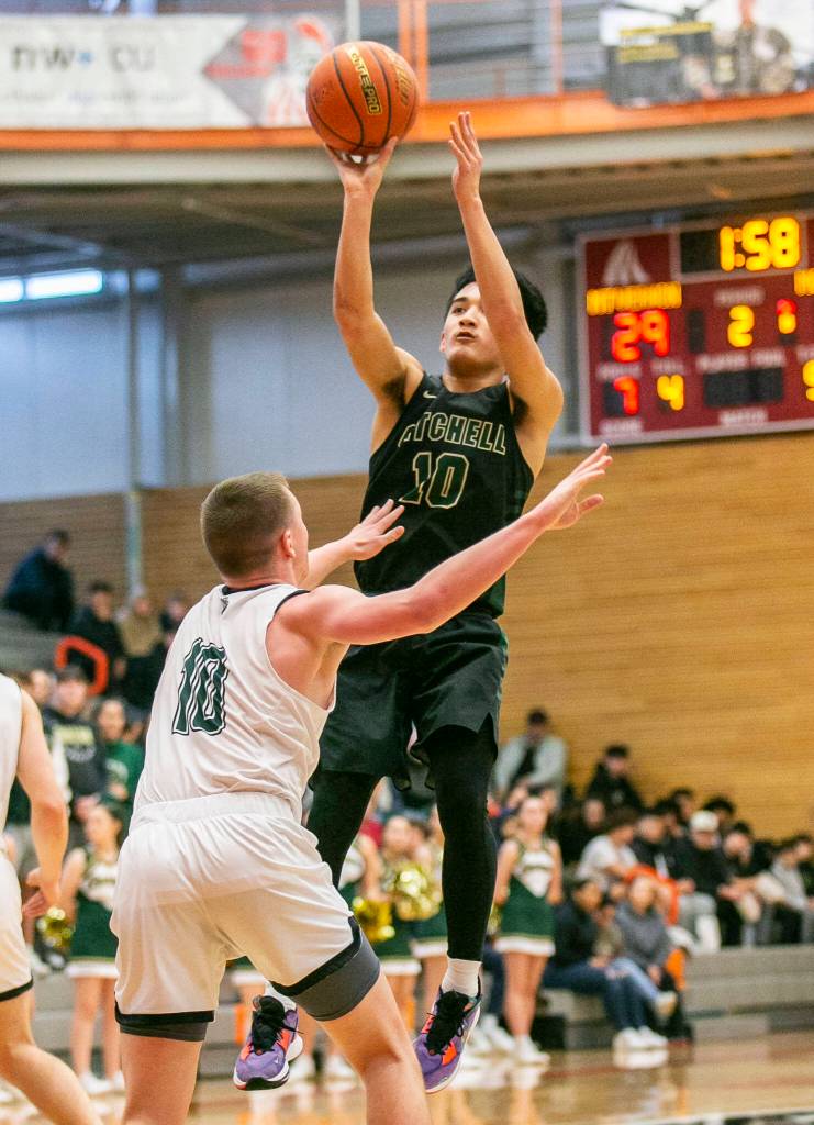 Marysville-Getchells Arion Palacol makes a jump shot during the game against Mount Vernon on Friday, Feb. 17, 2023 in Everett, Washington. (Olivia Vanni / The Herald)