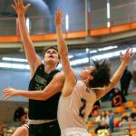 Marysville-Getchells Wyatt Harris attempts a layup during the game against Mount Vernon on Friday, Feb. 17, 2023 in Everett, Washington. (Olivia Vanni / The Herald)