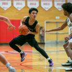 Marysville-Getchells Arion Palacol runs a play during the game against Mount Vernon on Friday, Feb. 17, 2023 in Everett, Washington. (Olivia Vanni / The Herald)