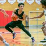 Marysville-Getchell’s Arion Palacol runs a play during the game against Mount Vernon on Friday, Feb. 17, 2023 in Everett, Washington. (Olivia Vanni / The Herald)