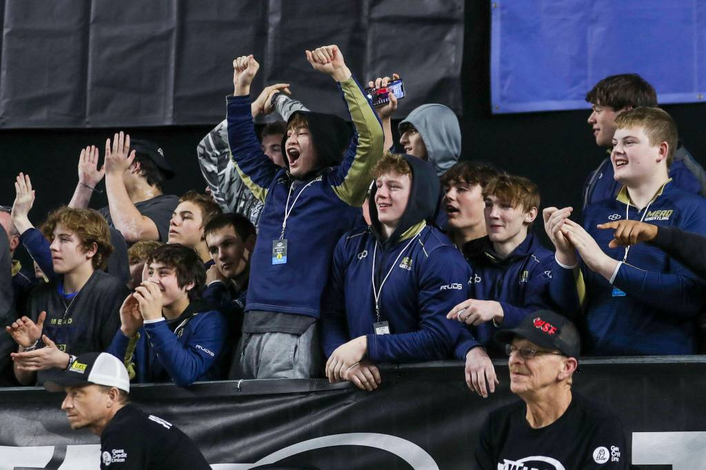 Attendees cheer during the Mat Classic XXXIV at the Tacoma Dome in Tacoma, Washington on Saturday, Feb. 18, 2023. (Annie Barker / The Herald)