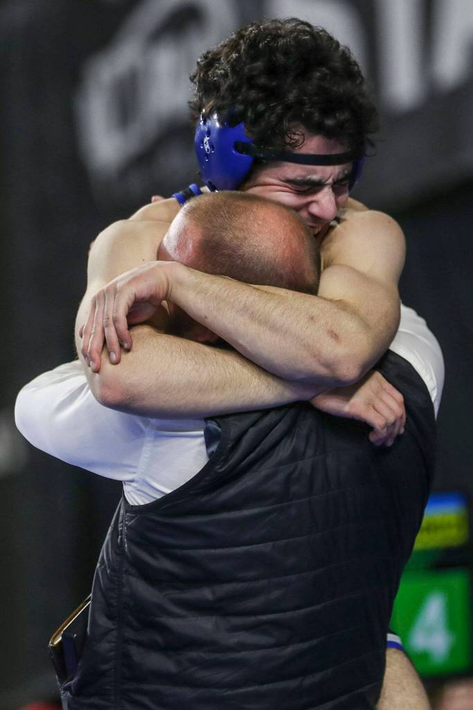 Walla Wallas Mateo Caso celebrates winning the 3A Boys 152-pound championship match during the Mat Classic XXXIV at the Tacoma Dome in Tacoma, Washington on Saturday, Feb. 18, 2023. (Annie Barker / The Herald)
